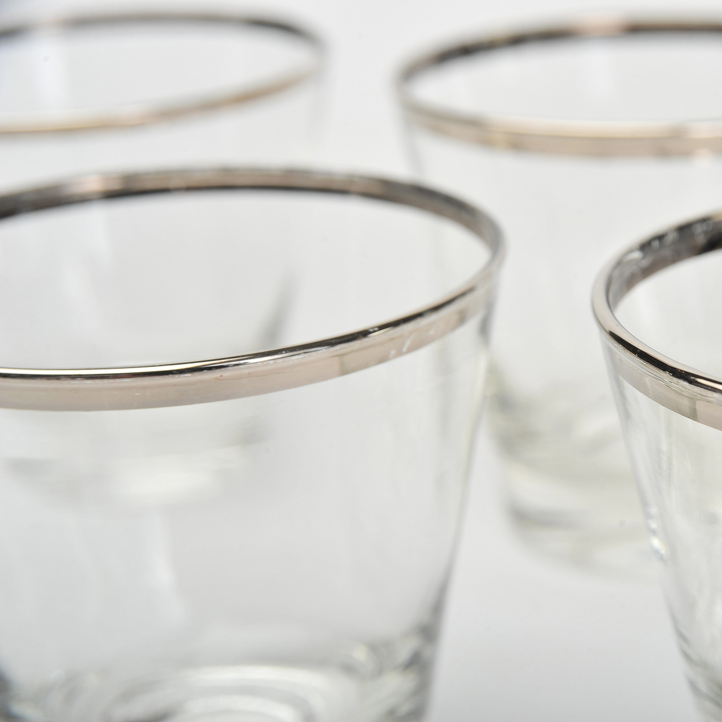 Eight silver-rimmed glasses by Dorothy Thorpe | Valerie Wade